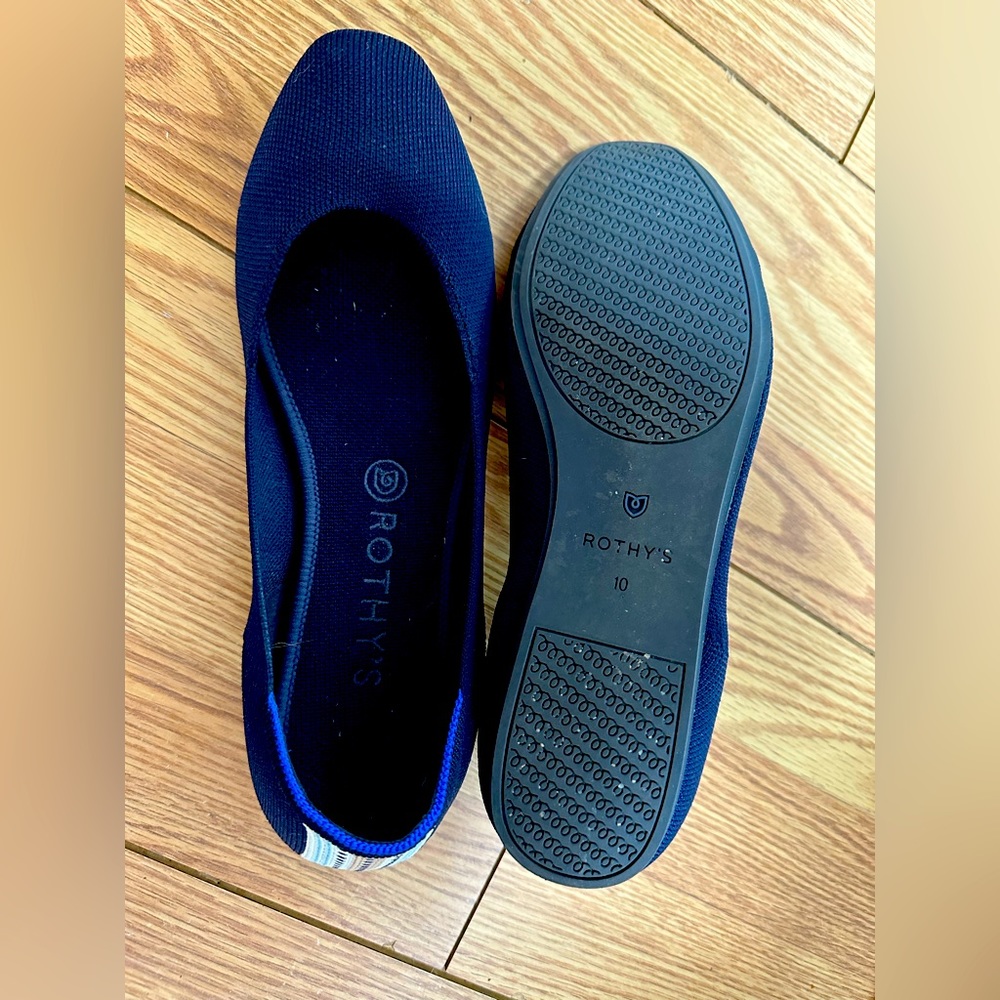 Rothy’s flats, size 10, navy blue with stripe on back